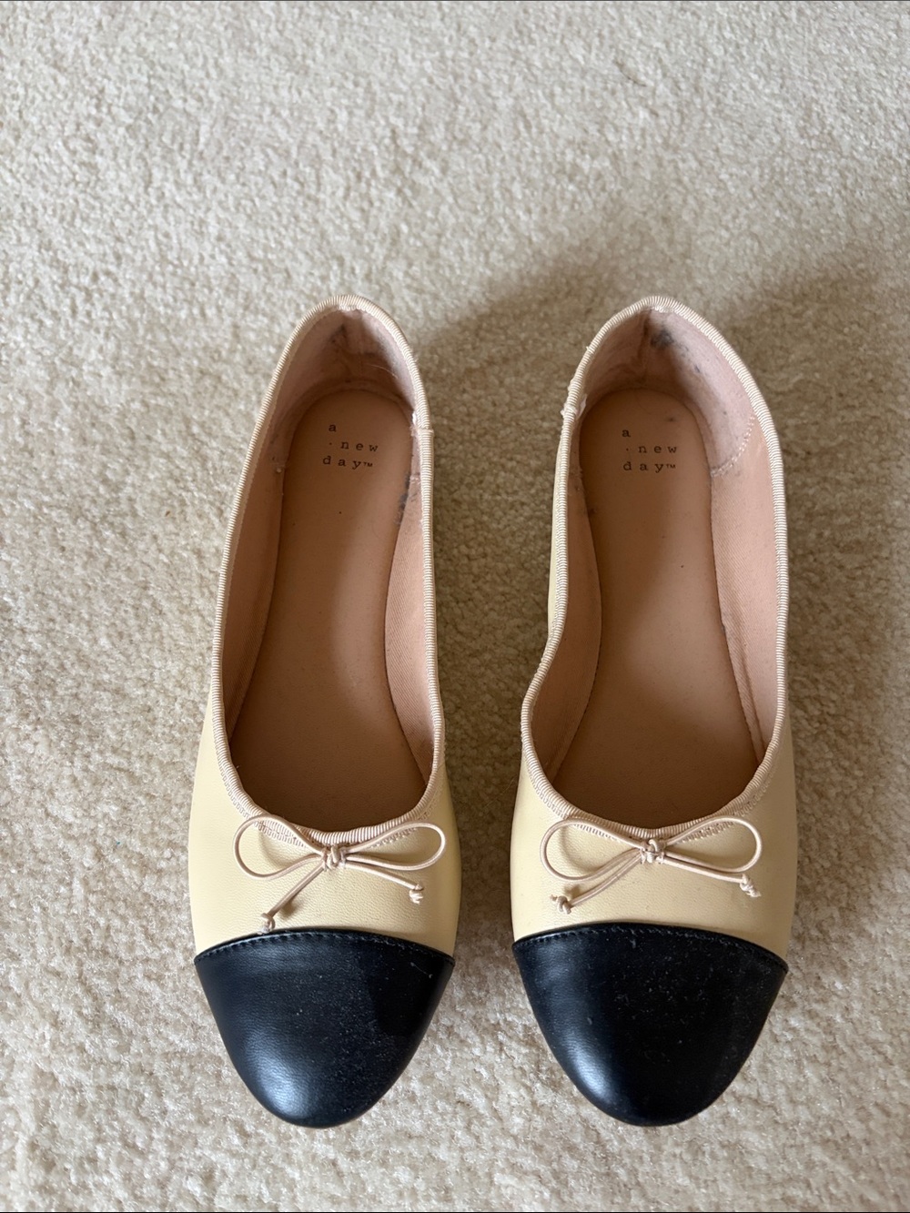 a new day Beige Ballet Flats with Black Cap Toe and Bow